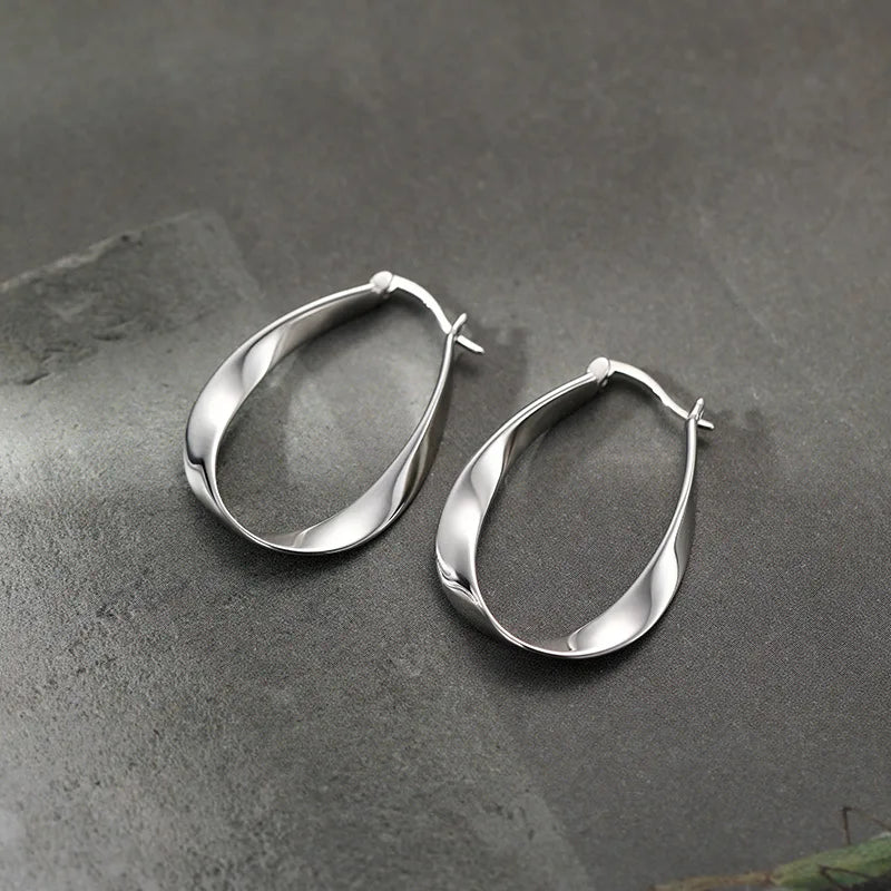 Gedrehte Tropfen-Creolen 925 Silber