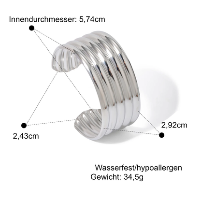Offene Armspange für selbstbewussten Look