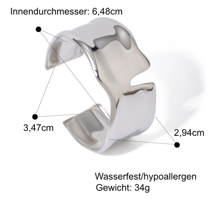 Offene Armspange für selbstbewussten Look