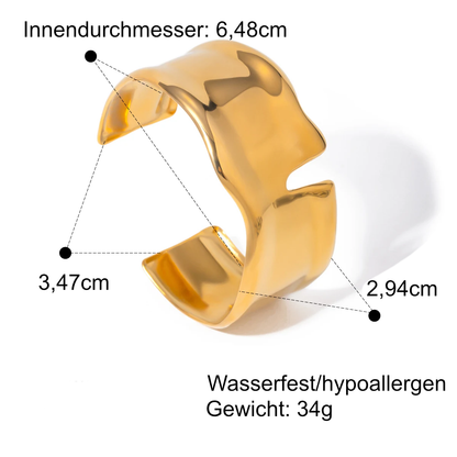 Offene Armspange für selbstbewussten Look