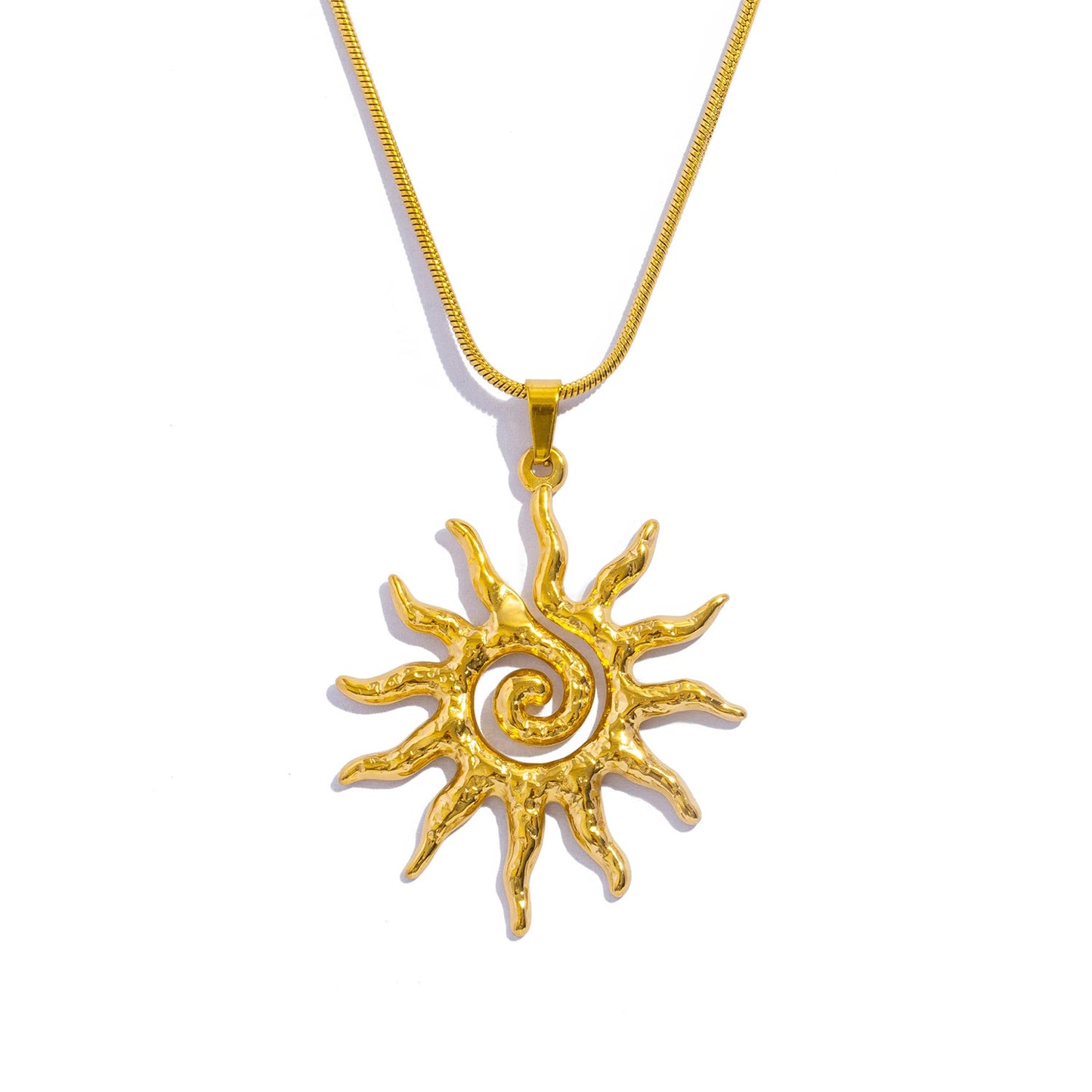 Sonnenamulett und Ohrringe