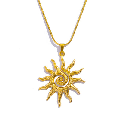 Sonnenamulett und Ohrringe