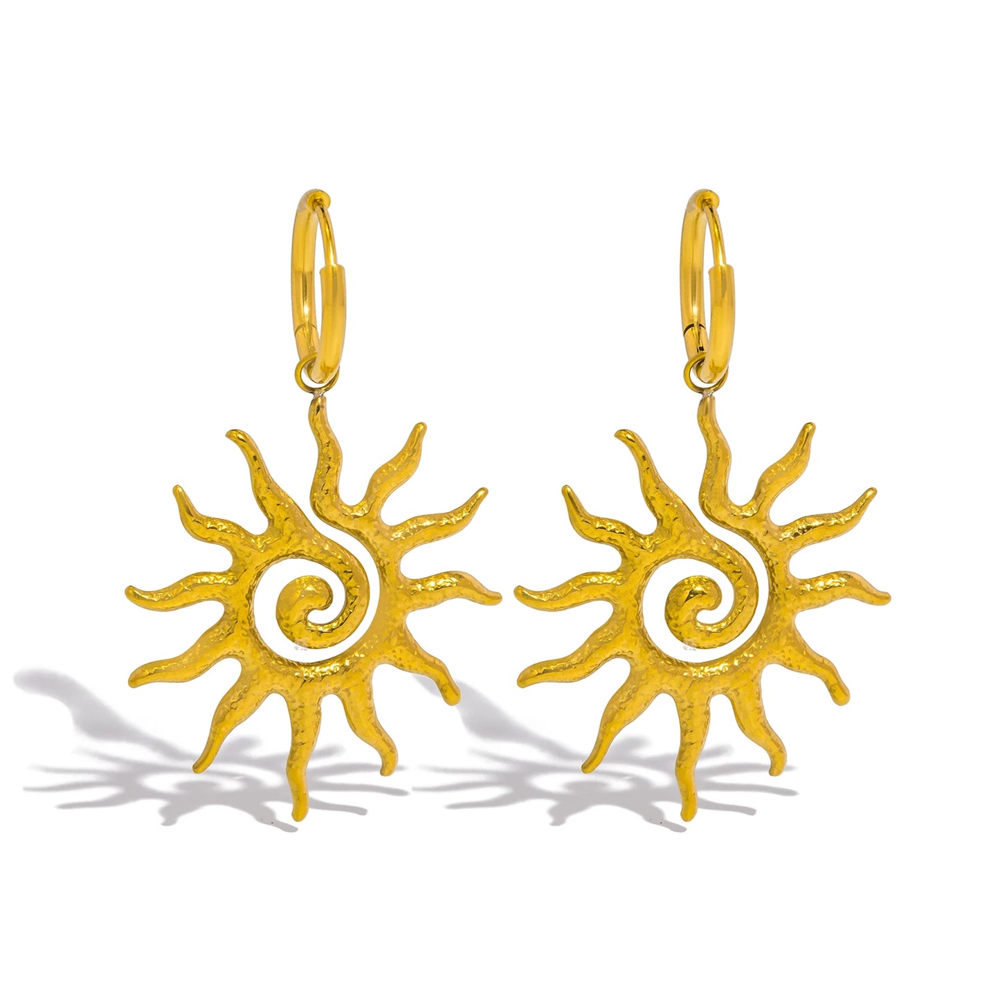 Sonnenamulett und Ohrringe