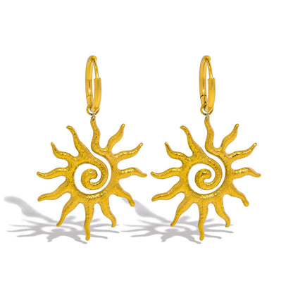 Sonnenamulett und Ohrringe